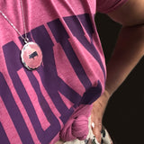 pink lucky pig pendant on silver chain