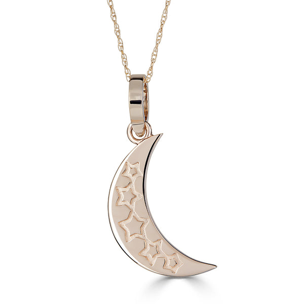 Reversible crescent moon charm pendant with etched star pattern