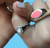 shield shaped enameled pinky ring with garnets, black silver and pearl enamel and pink enamel signet ring