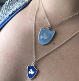 layered blue enameled dove pendants in sterling silver