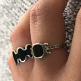 black and silver enameled rings
