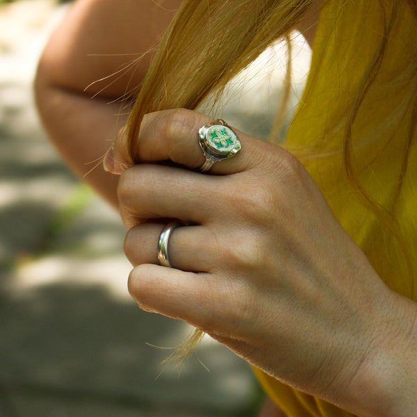 green enameled quatrefoil stained-glass inspired ring