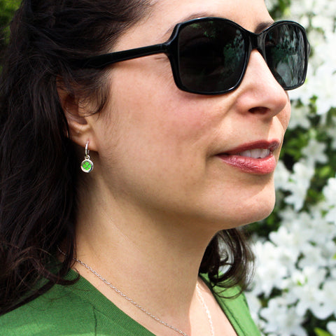 green enamel four leaf clover design on hoop earrings