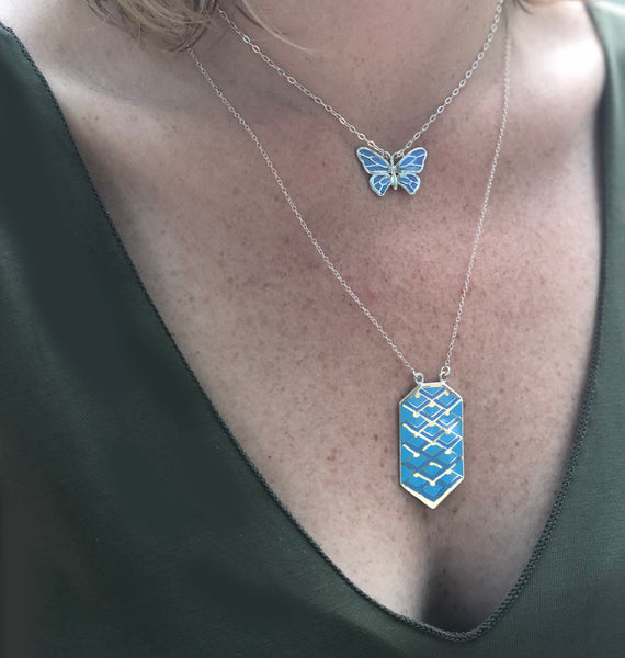 blue enamel butterfly necklace and blue enamel deco pendant layered
