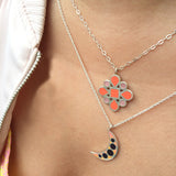 orange and red enamel moon and flower layered necklaces