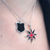 black and red layered star and enamel shield necklaces
