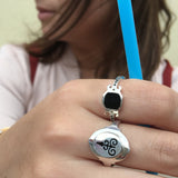 black and silver enameled rings